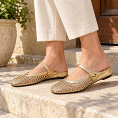 The Woven Mary Jane Mule, gold pair worn on foot